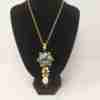 Collana acciaio smalto oro con ciondolo in ceramica di Caltagirone